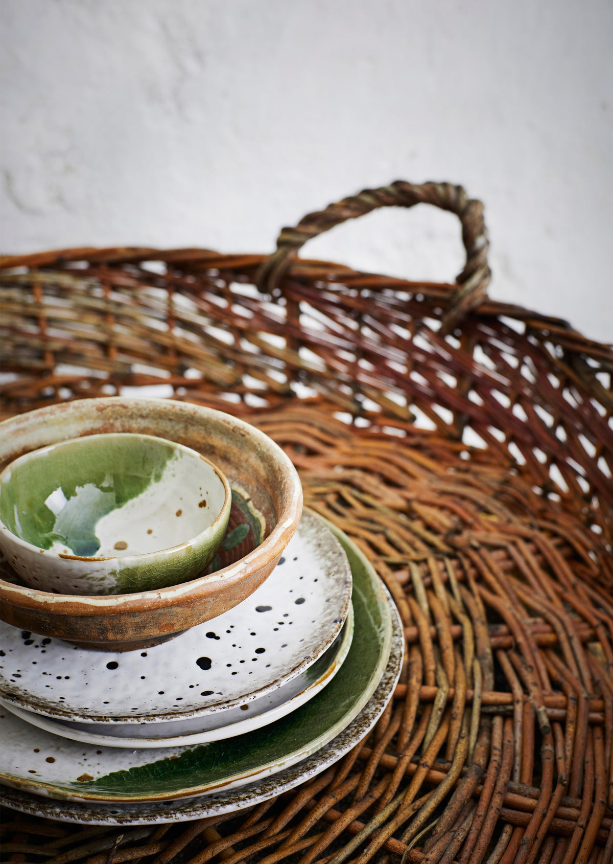 beigbe and brown speckled dining crockery