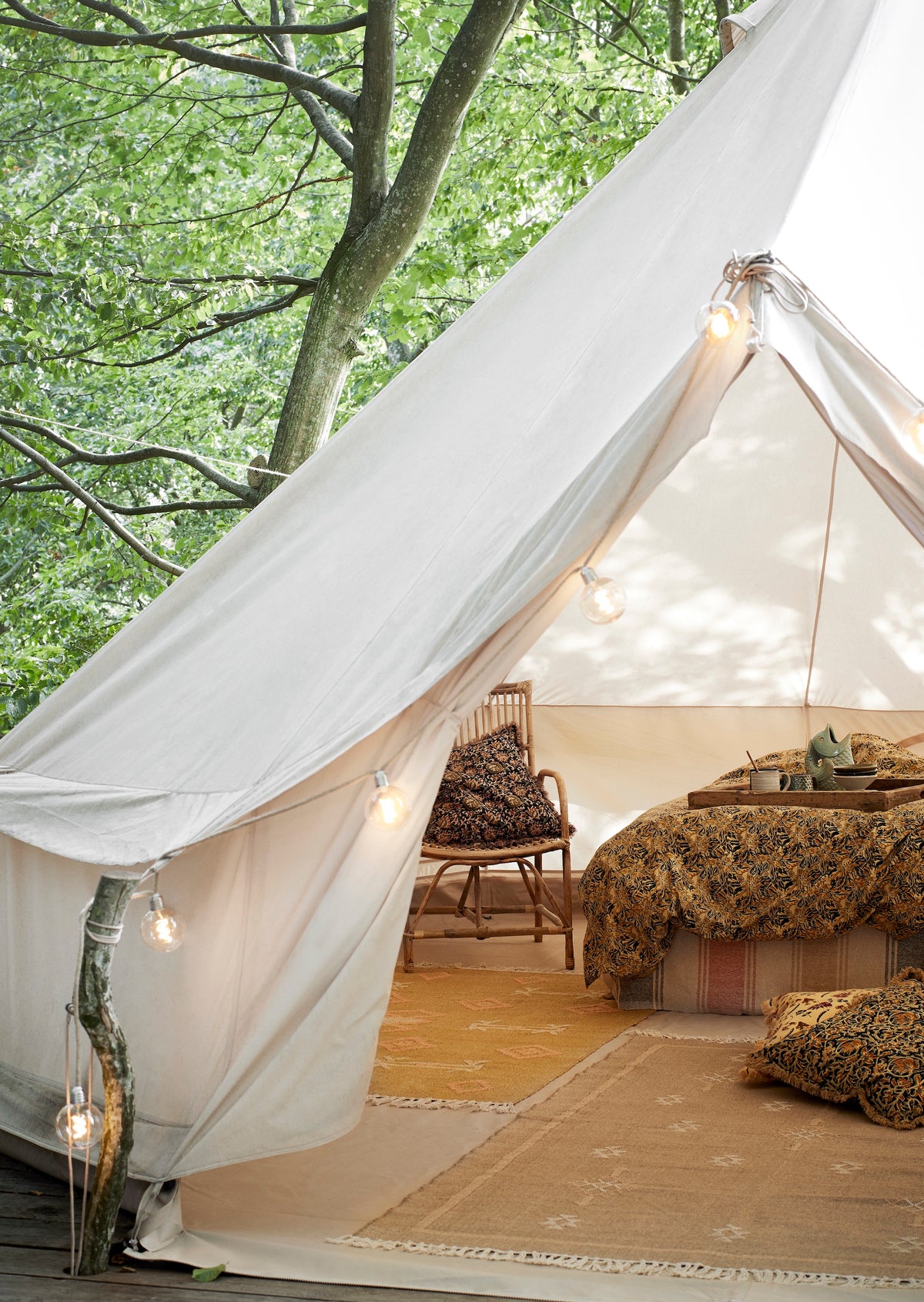green stoneware mug with dotted texture styled on rustic wooden table
