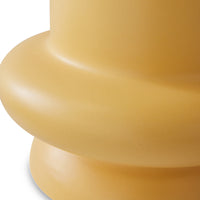 close up of the smooth finish to an hkliving accent table in honey collour and with generous curves