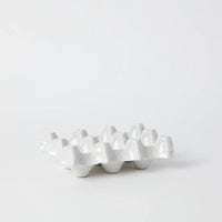 Side view of the Nea 6-egg tray by Olsson & Jensen
