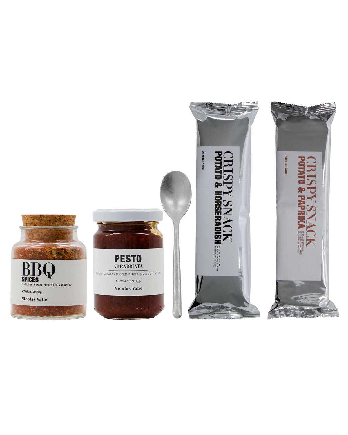 Contents of the Nicolas Vahé Double Dipper gift bag: BBQ spices, Arrabbiata pesto, silver-finish spoon and two bags of potato crisps
