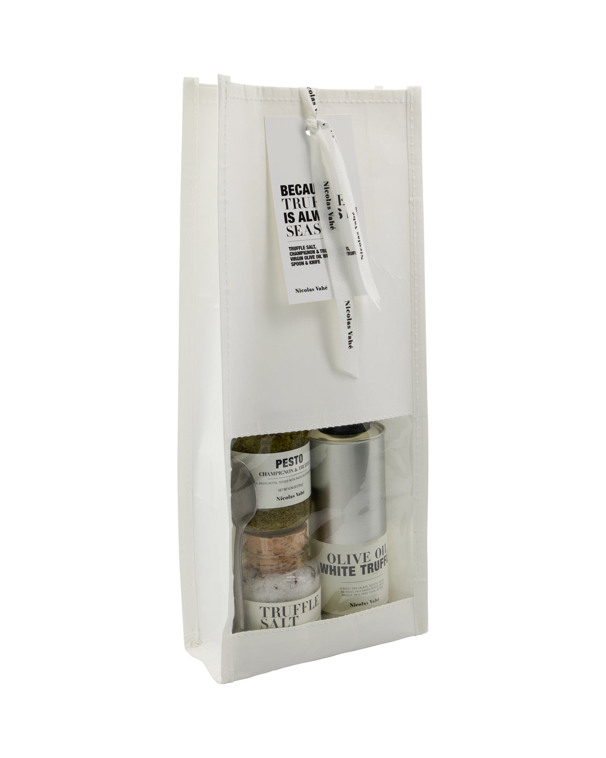 Nicolas Vahé truffle gift bag, white windowed bag with hang tag showing truffle pesto, salt and oil inside