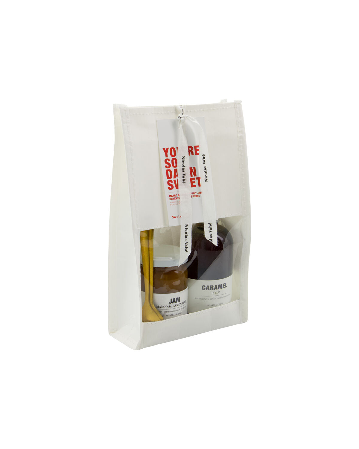 Nicolas Vahé You're So Damn Sweet white windowed gift bag with red hang tag, jam and caramel syrup inside