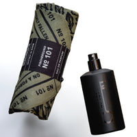 bottle of the fischersund 101 eau de parfum handwrapped in bandana