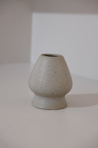 neutral pebble chasen stand for bamboo matcha whisk angled view
