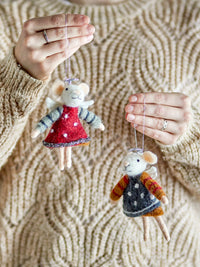 Two felt wool mouse ornaments with angel wings and hand-stitched details