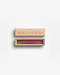 Open box showing colourful wooden sticks neatly arranged