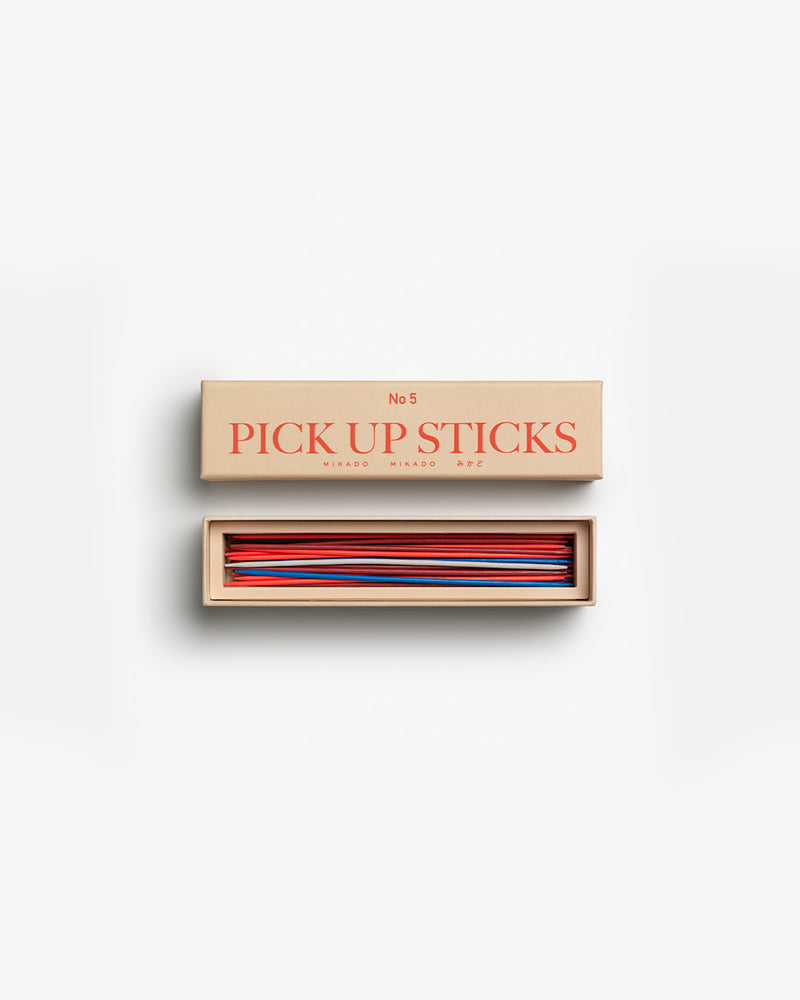 Open box showing colourful wooden sticks neatly arranged