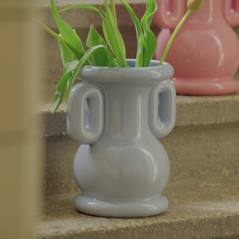 Sculptural statement vase by &klevering, crafted in Portugal styled on a concrete step with tulips