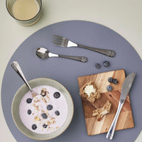 Reversible black and grey leather placemat styled with breakfast setting