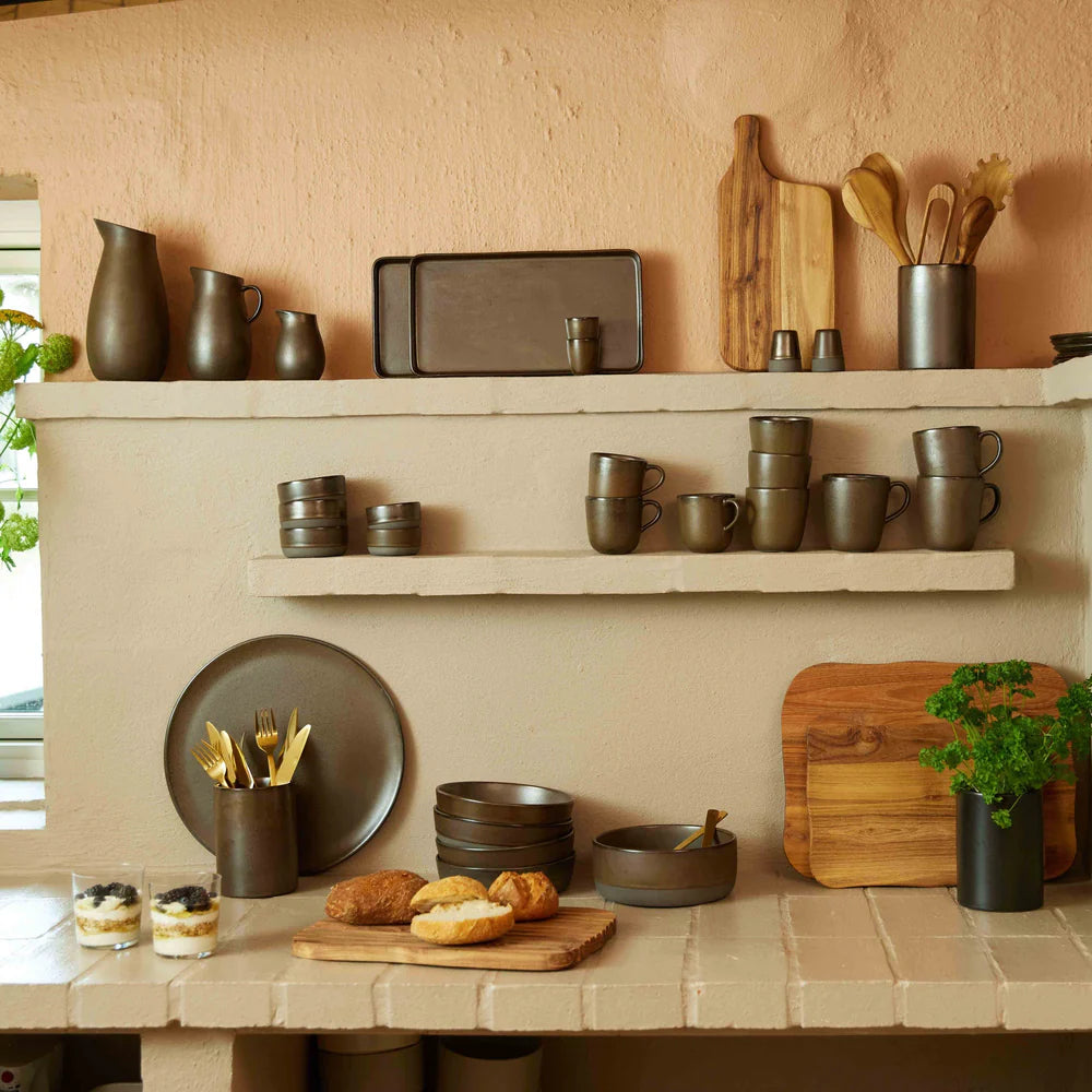 Minimalist salt and pepper shakers with other crockery for modern Nordic-inspired dining