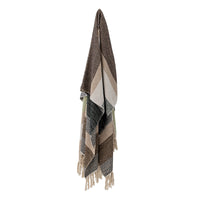 Neutral striped recycled cotton throw hanging