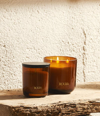Royal Amber scented candles in two sizes, single wick and three wick in amber glass