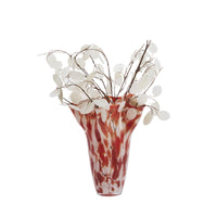 cutout image of large rust and white marbled glass vase with wavy rim
