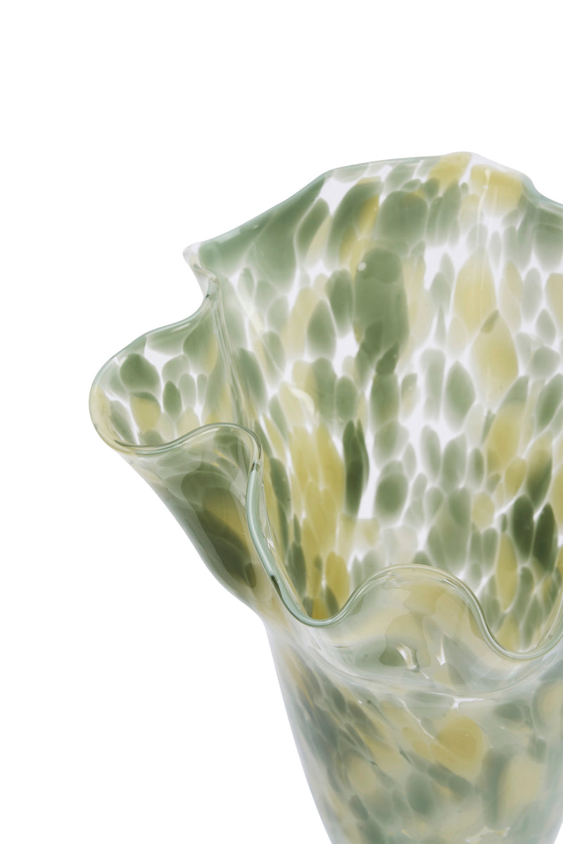 close up of sage green art deco glass vase with wavy sculptural rim