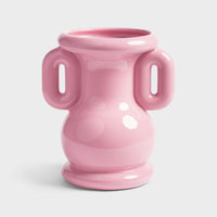 Sculptural pink stoneware vase with amphora-inspired handles for easy flower arranging.
