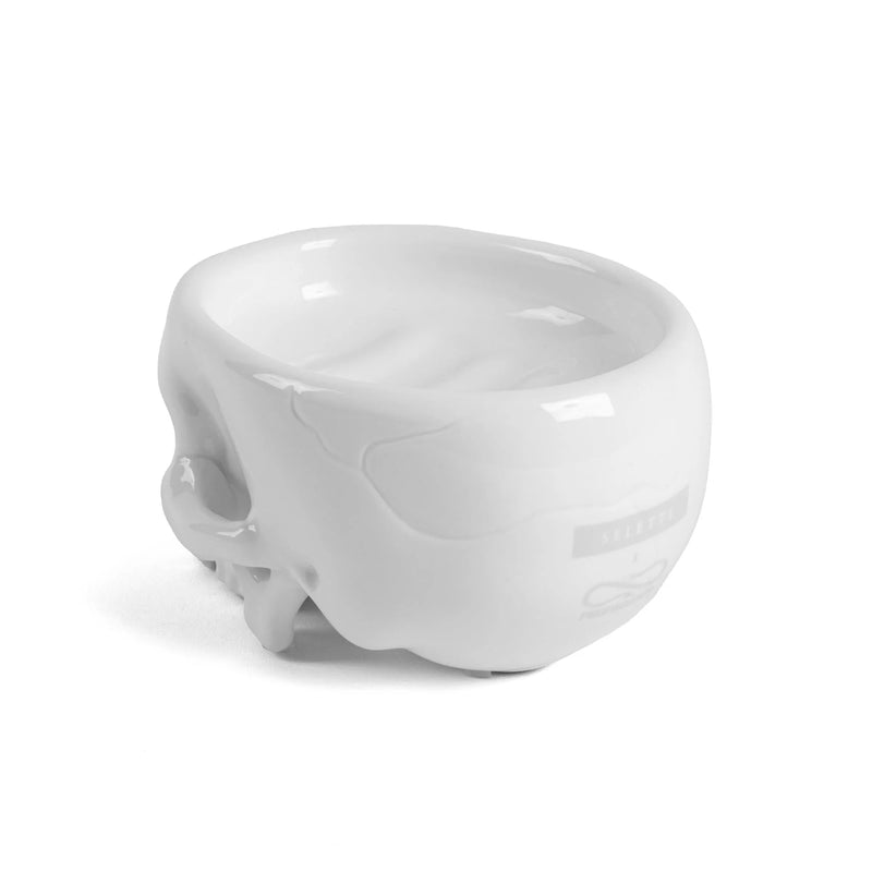 Brain Wash white skull soap dish showing smooth back and glossy finish.
