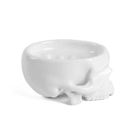 White porcelain skull soap dish by Seletti, front angle.
