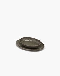 Serax Inku green oval bowl showing the reactive glaze