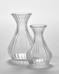 Serax Inku ribbed glass carafes in small and extra small sizes side by side