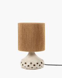 Oya stoneware table lamp by Sophie Casier for Serax with beige perforated base and brown shade