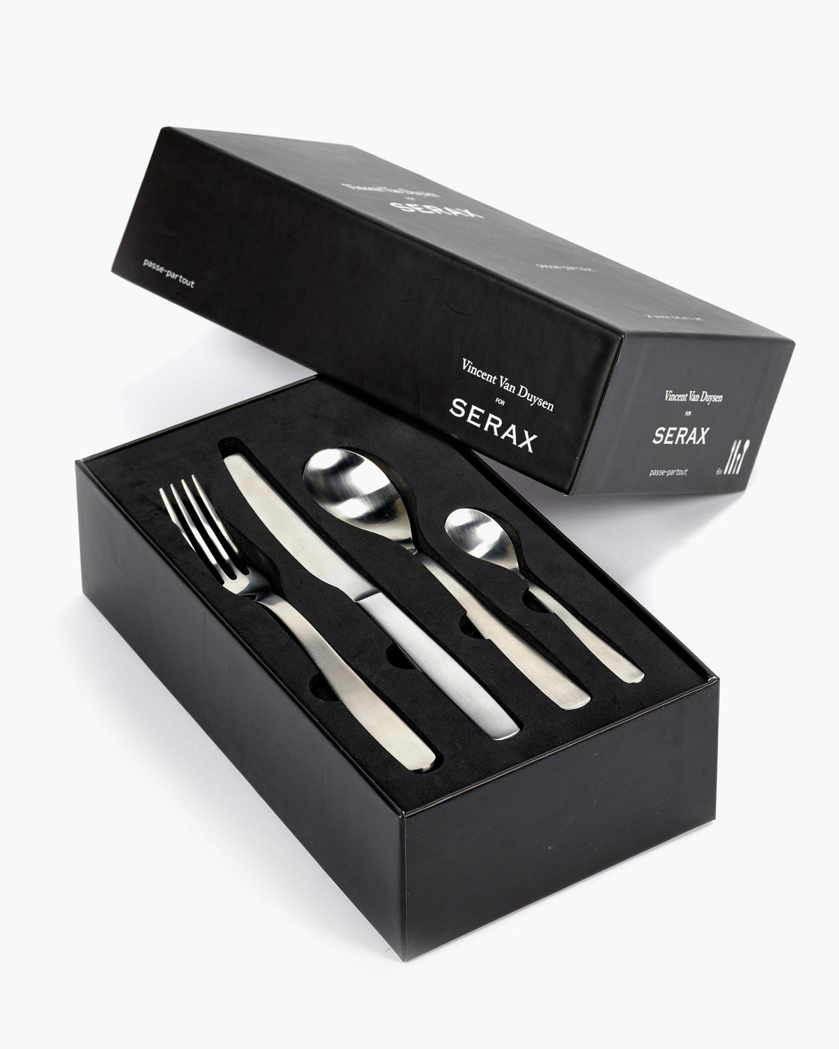 Serax Passe-partout 24-piece cutlery set laid out in its open black gift box