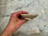 Side profile of raised handmade ceramic soap dish for dry soap storage
