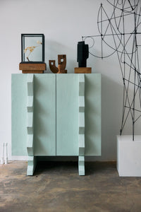 HKLIVING small burned wooden sculpture adding contrast to a modern cabinet display