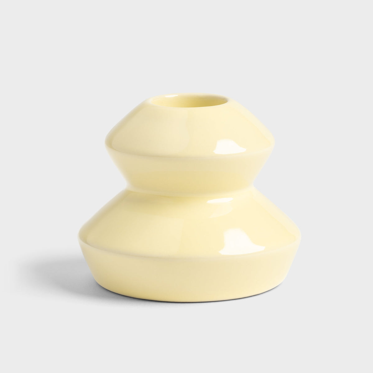 Small stoneware candle holder in glossy cream by &Klevering