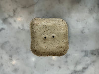 Square handmade soap dish in speckled glaze with drainage holes by Lee Simmonds