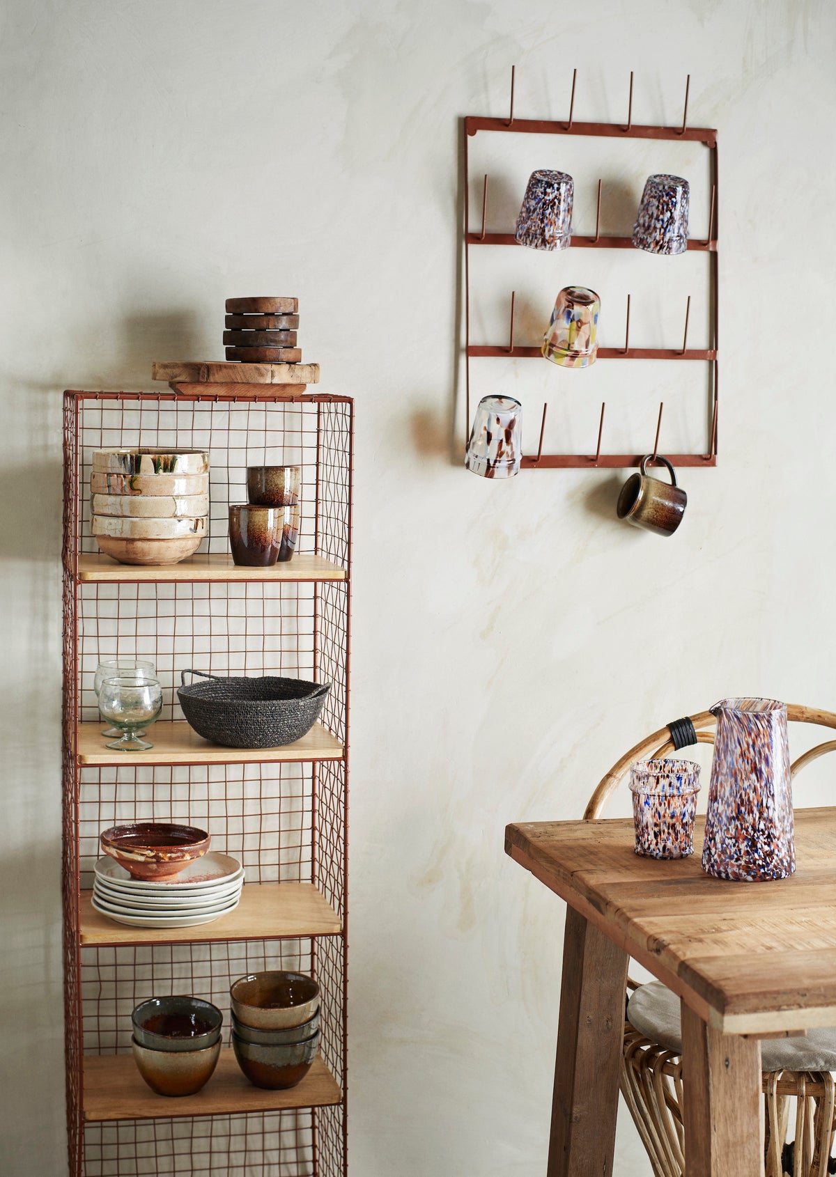 assorted coloured drinking glasses with unique patterns arranged together
