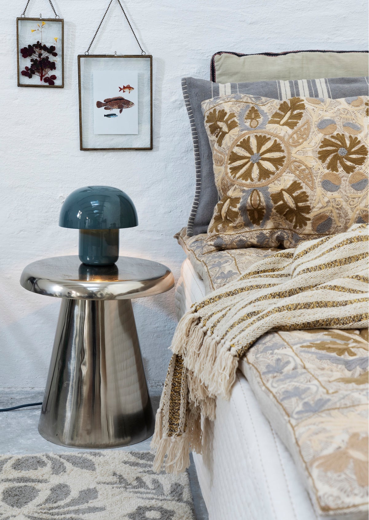 recycled cotton throw with off white and mustard stripes, folded with fringe
