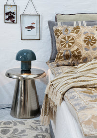 recycled cotton throw with off white and mustard stripes, folded with fringe
