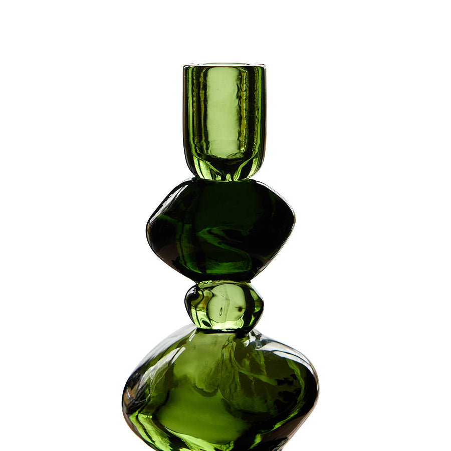 Close-up of stacked glass detail on medium emerald candle stick