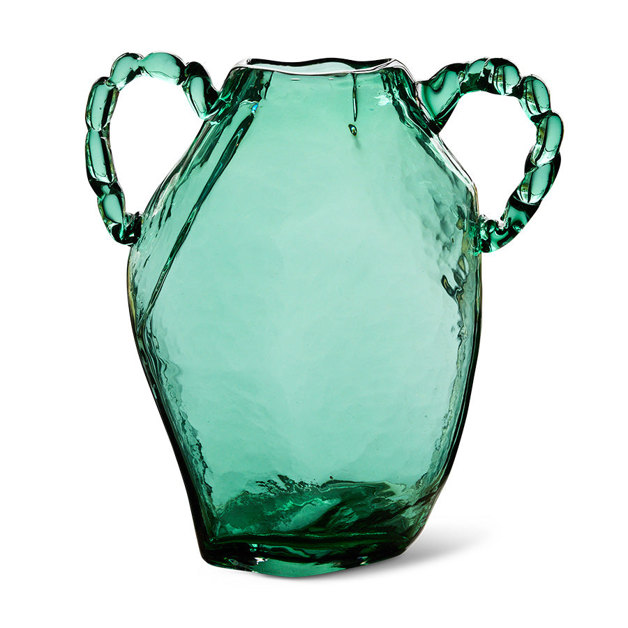Green glass amphora hkliving vase with twisted handles on white background