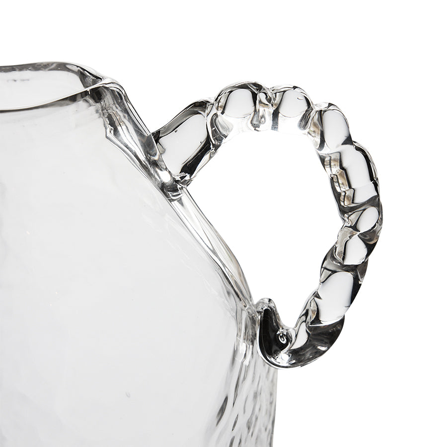 Alternate angle of clear glass amphora vase showing faceted body