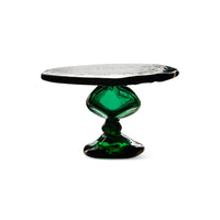 Side view of emerald glass dessert stand showing sculptural stacked base