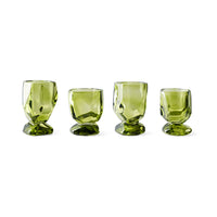 Set of four Nienke Sikkema for HKLIVING emerald green wine glasses on white background showing variation in size and form