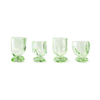 Set of four green hand-blown glasses with sculptural gem-like stems by hkliving