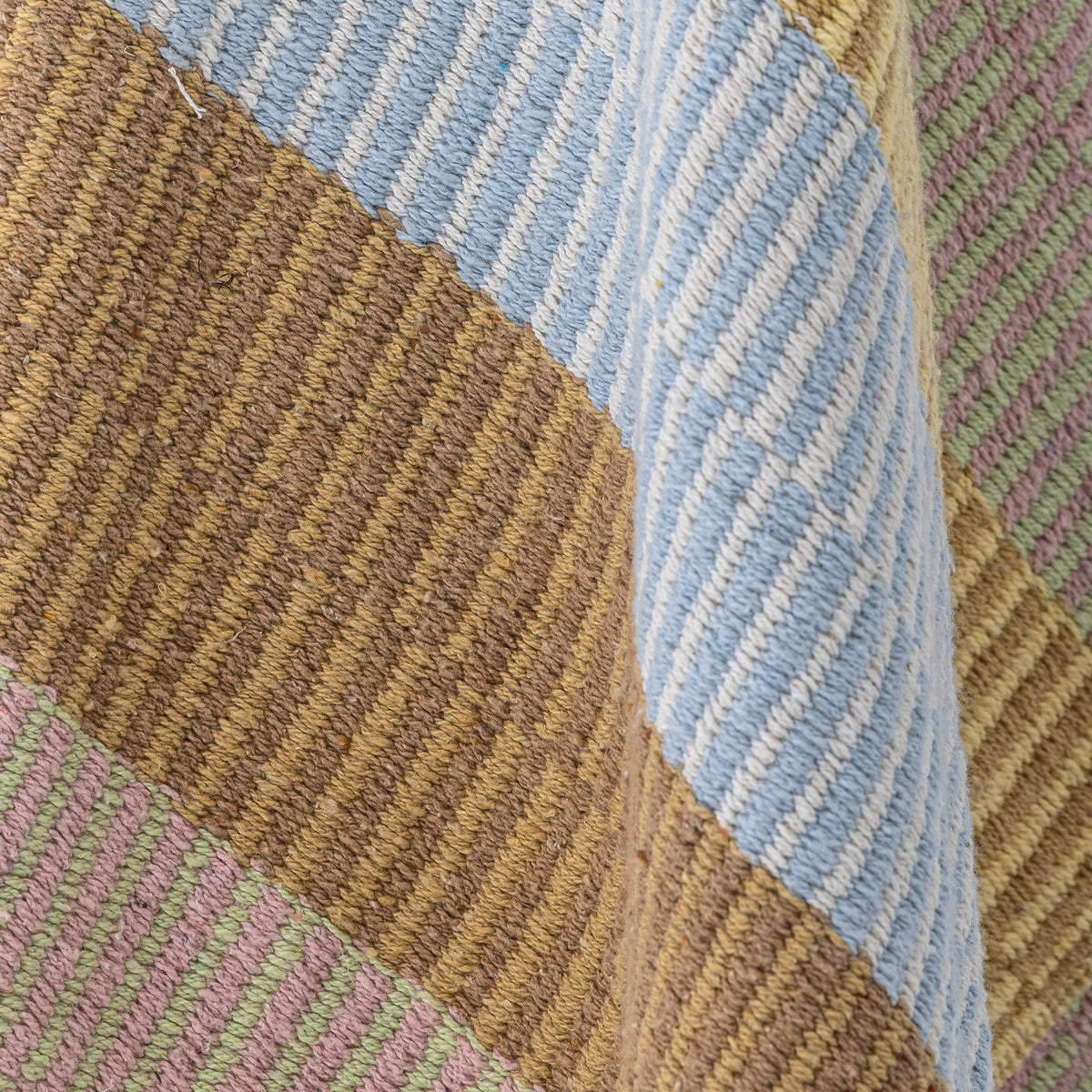 Close-up of striped recycled cotton Isnel throw
