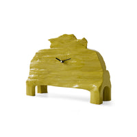 Three-quarter angle view of the HKLIVING chartreuse mantle clock, highlighting the glossy textured surface and curved legs