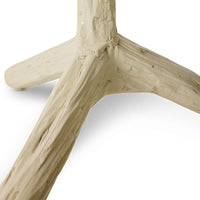 close-up of the tripod foot on the Teun Zwets for HKLIVING Overcast floor lamp, showing the carved Sungkai wood texture