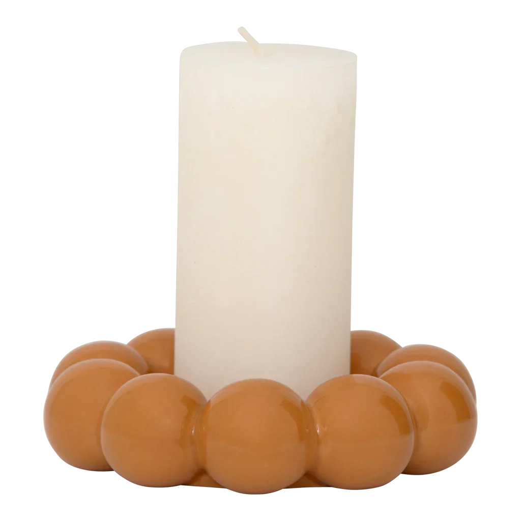 Talon candle holder with an ivory pillar candle