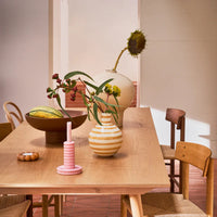 Urban Nature Culture pieces styled on a wooden dining table