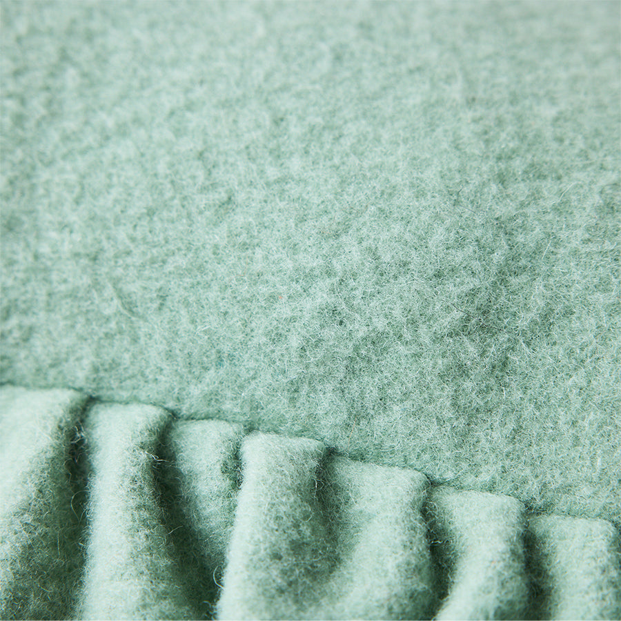 Close-up texture detail of HKLIVING mint felt cushion fabric and ruffled edge