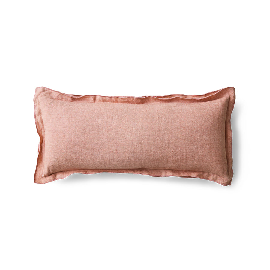 Front view of dusty peach linen cushion on white background