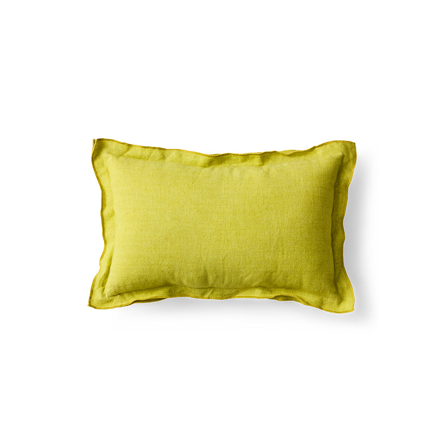 Lemongrass yellow linen cushion on white background