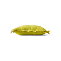 Side profile of lemongrass yellow linen cushion showing flanged edge