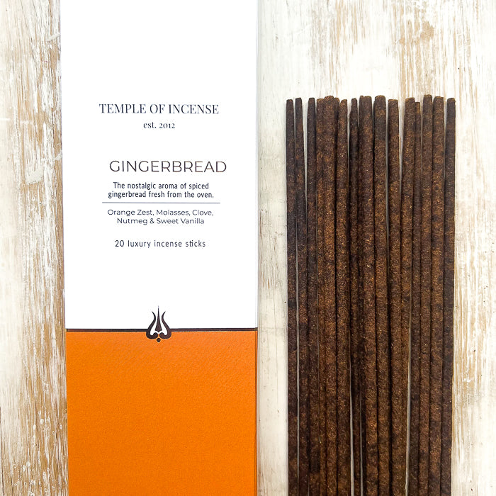 Close-up of Temple of Incense Gingerbread luxury incense sticks beside the box.