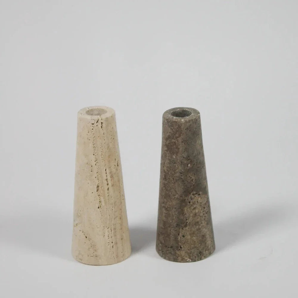 Pair of light and dark travertine cone candle holders by Olsson & Jensen